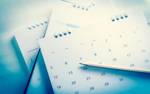 Several Calendars on a desk